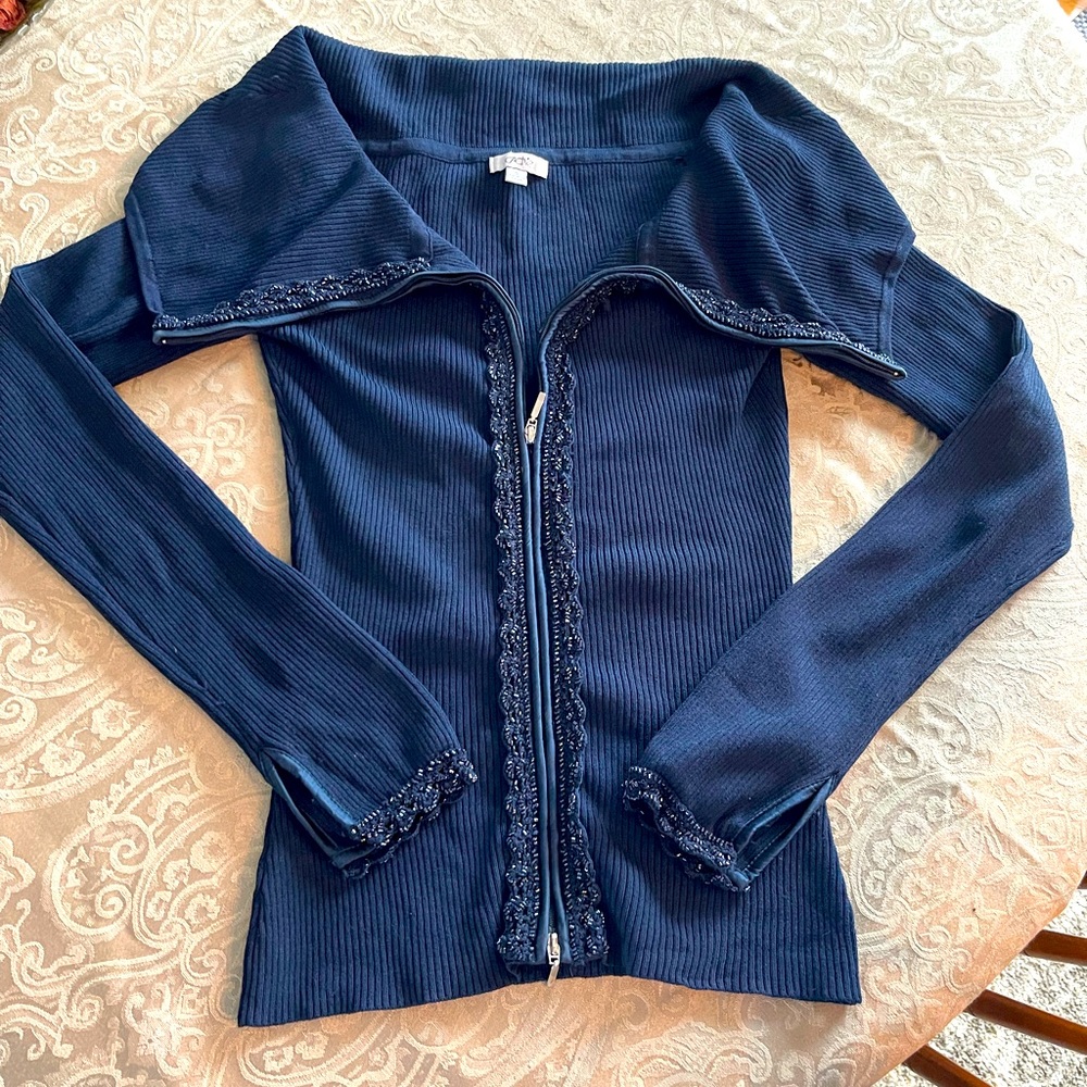 Cache embroidered sweater . Zip up. Can be worn off the shoulder